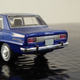 Illustration for article titled Hot Sixty 4th: Samurai Sunday Tomica TLV- Nissan 1500 deluxe
